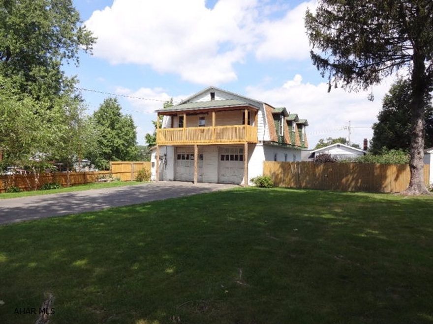 This Philipsburg home has appeal both inside and out with a variety of updates in the upper living area, a deck and fence outdoors, and a huge garage below. The 35 x 25 garage boasts 9' high doors, tall ceilings, a workbench, and built-in shelving; an awesome space for your next project. In the living room, appreciate original hardwood floors and the inviting entrance to the deck, which spans the width of the house, all while boasting newer windows throughout. The kitchen is nicely updated with newer cabinets and appliances, while the bathroom is also updated with ceramic tile shower walls, ceramic tile floor, and a solid surface sink. The backyard is fenced-in providing privacy and there is also a shed for extra storage.