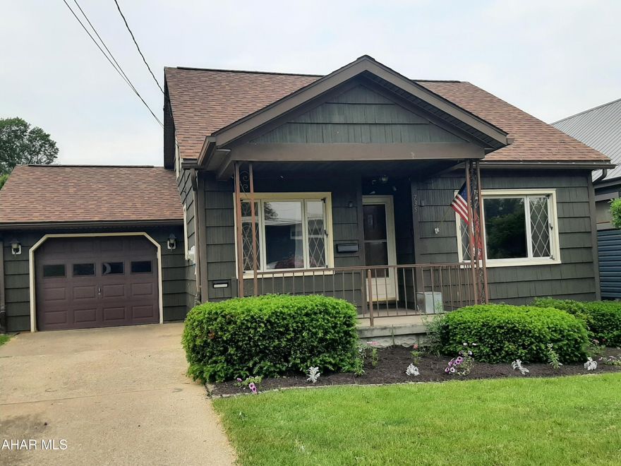 Welcome to this most adorable home in Central Cambria School District. This charming home has been well maintained, updated throughout and is move in ready! The front entrance welcomes you into the fully equipped kitchen with large cottage style windows, window seat with storage and large custom island. There are plenty of cabinets and counter space for all your cooking and baking needs. The kitchen is open to the spacious and bright living room with original hardwood floors. The wide hallway leads you to the beautiful full bath with a walk in tub. This is a very unique feature that offers ease and convenience. There are 2 very nice sized bedrooms on the main level with original hardwood floors, nice closet space and lots of natural light. The upstairs of this home offers 2 more bedrooms with brand new carpet, cubbie storage and closet space and again plenty of natural lighting. The mechanics of this home are also updated with newer furnace and central air. The basement offers the laundry and half bath for convenience. High ceilings in this area make it possible for finishing. The exterior of this adorable bungalow has fresh paint and a new roof in 2024. The one car attached garage adds additional storage and easy access into the home. The spacious backyard offers plenty of room for outdoor activities. Enjoy the firepit for the upcoming summer evenings! This home is a must see! Priced to sell! Call today for your private tour!