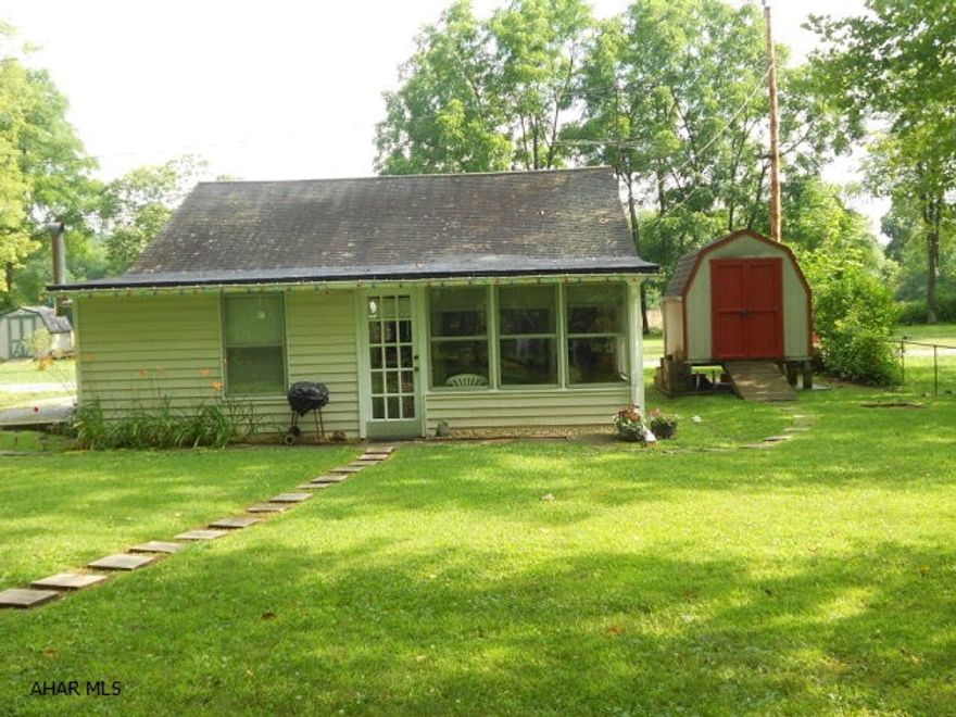 Hard to come by cottage, great condition, flat lot with a great dock, fire pit and hooked to public water and sewer. Open living space, two main level bedrooms and a full bath. Loft area with extra space for sleeping. Enjoy the outdoors, kayaking and fishing or plain out relaxing.