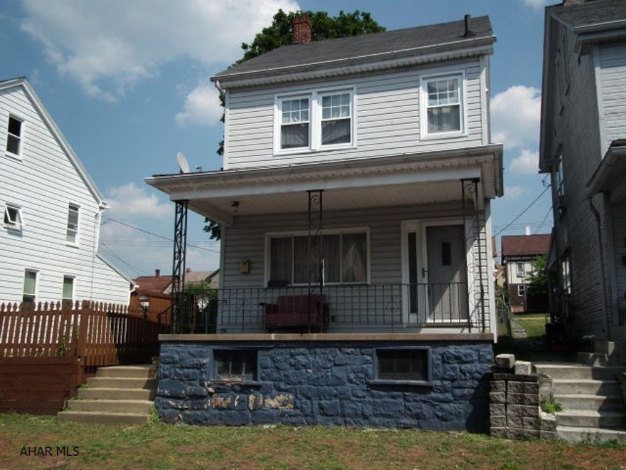 Come see this 2 bedroom (possibly 3)& you won't be disappointed.  Kitchen and bath have ceramic tile floors, dining room has double doors leading to side deck for you to enjoy.  Plenty of outside space & parking area behind property as well.  Kitchen appl's included, as well as washer/dryer, making this ready for you to move in today!