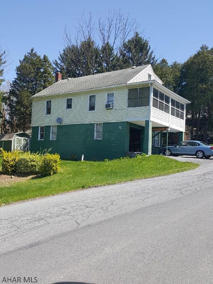 Close to town, double lot, plenty of room for a pool or garage. Hardwood floors under wall to wall carpet, lots of living space in this home.