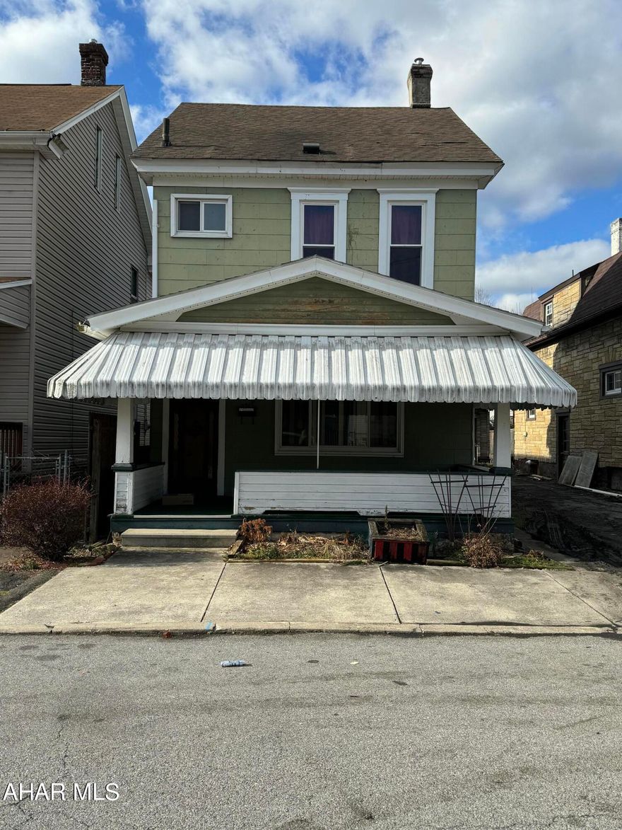 Take a tour of this cute 2BR home with a finished attic that could be a third room! Home is perfect for a first time home buyer or someone looking for an investment property. 
With a little TLC, this home has huge potential. You could move in and work as you go! Seller will leave all furniture in home if buyer wants. All new windows in upstairs.  Updated furnace. Call listing agent to tour!