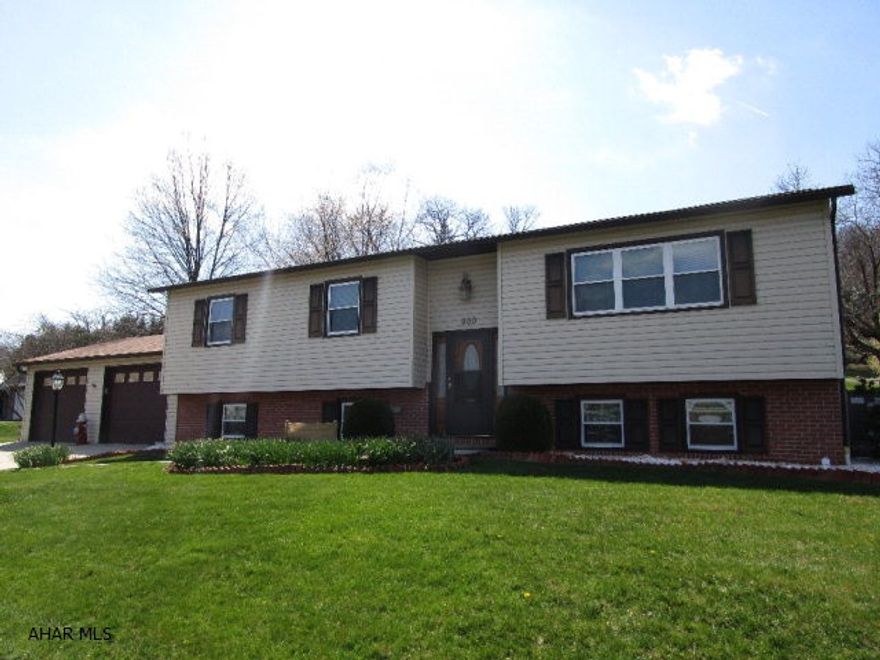 This split entry home is meticulously maintained inside and out!!  The main level offers a living room, kitchen w/ oak cabinets and solid surface counters, dining room, large sun room, 3-beds and 2-full baths.  Lower level offers a large family room, additional bedroom, full bath, den and bonus room.  Lower level could easily be used as an in-law suite.  Heat pump with central air, 200-amp electric and a finished 2-car attached garage with heat and air.  This home is really in outstanding condition with lots of space for the whole family.