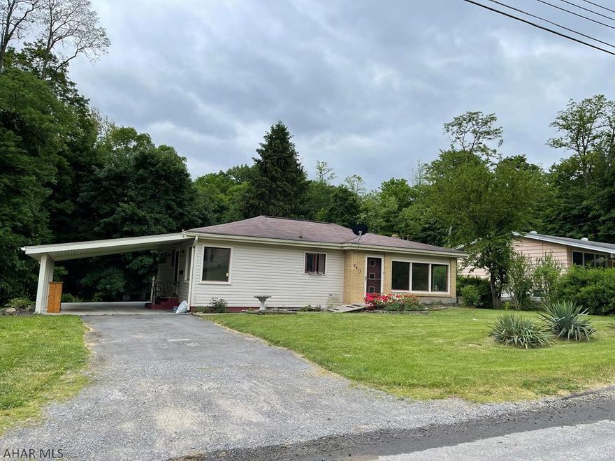 BRAND NEW PRICE!! LOVELY AREA:)  One story living on large level lot.  Close to shopping, and lots more, but not feel like "city" living.  Hardwood floors, Spacious living room w/lots of natural light.  The laundry is currently and conveniently located in the one bedroom. There is a large LEVEL yard as well as a nice sized carport - so you don't need to worry about the elements when getting to your car.  Priced to sell!  Call listing agent for your private tour today.