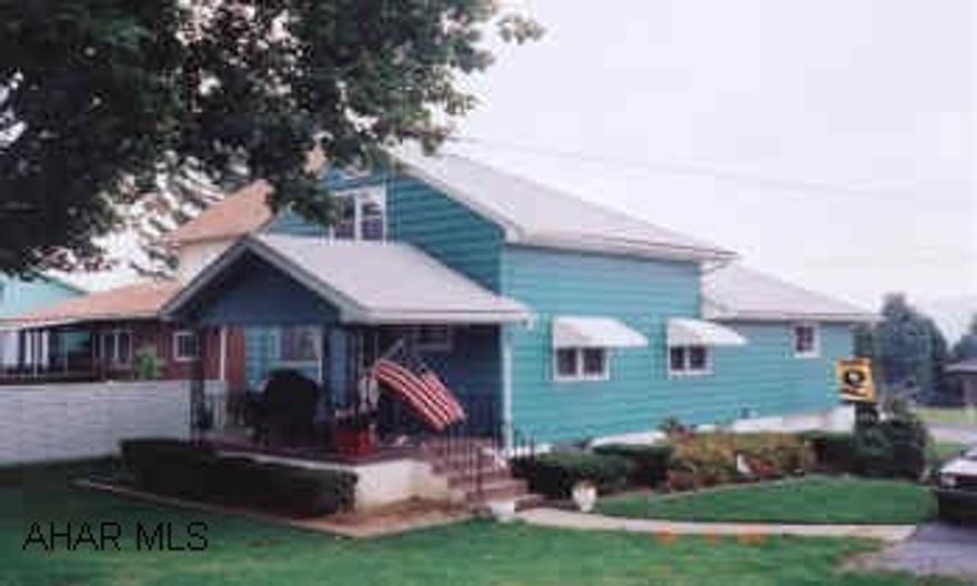 WELL MAINTAINED 1.5 STORY HOME, NICE CORNER LOT. COVERED PORCH. HARDWOOD FLOORS. SOME NEW WINDOWS. NEW H.W. FURNACE. FINISHED  ROOM IN BASEMENT.