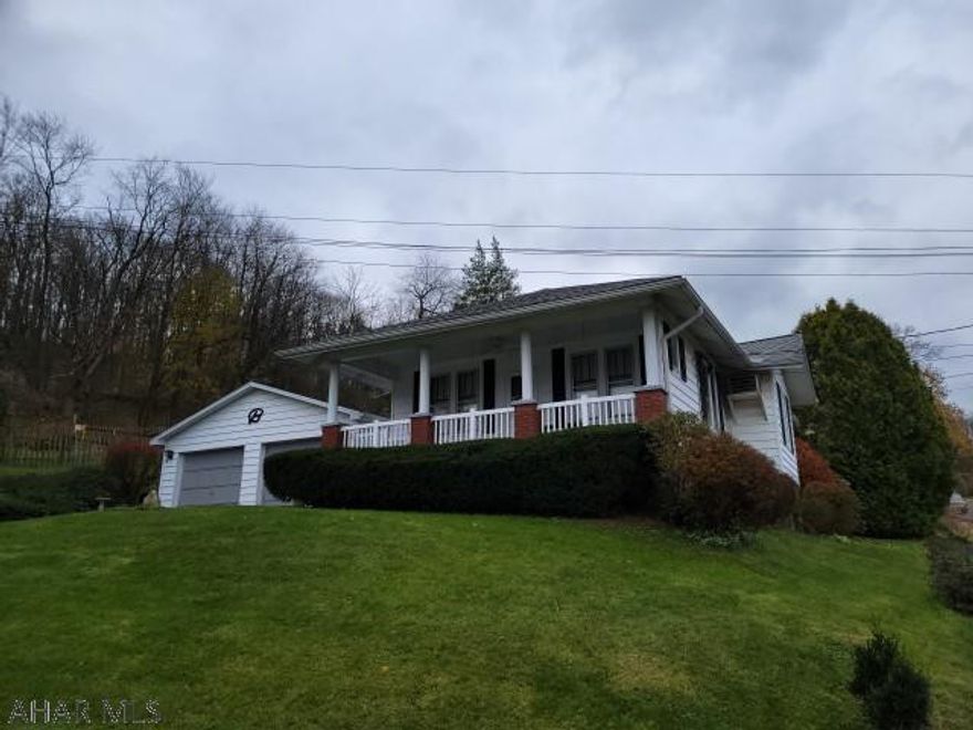 Nice 1 story, 2 bedroom home on corner lot. Hardwood floors. Updated bathroom. New roof. Partially finished basement. 2 car detached garage. Good location near schools and hospital.