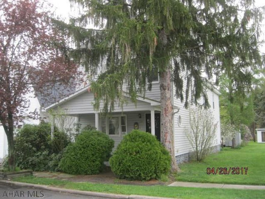 Your opportunity to live close to the schools.  With some TLC and some sweat equity, this could be a great home near the schools and ball fields.  Lots of space to spread out, or, property could be duplexed again very easily.  Let your tenant pay the mortgage!  Separate electric to second floor.  Large yard.  Brand new hot water tank.