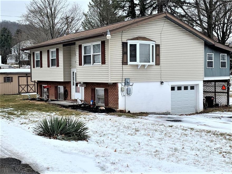 New Year New Home for YOU!  Well maintained home in the heart of Bedford!  3 spacious bedrooms with 1 full bath shower/tub.  Large living areas including the living room flowing into the dining room and wait don't forget the sunroom!!  The sunroom could be used for extra living area, office or anything you would like!  Beautiful sunporch for more living area in the winter months and deck in the summer.  Easy living on one level!  The basement is unfinished including plenty of storage.  A one car attached garage.  Come right into the flat driveway straight into the house! Lots of space inside and outside including a low maintenance yard.  Walking distance to downtown Bedford shops and attractions! Great location on side street!  A must see! HOME WARRANTY INCLUDED!