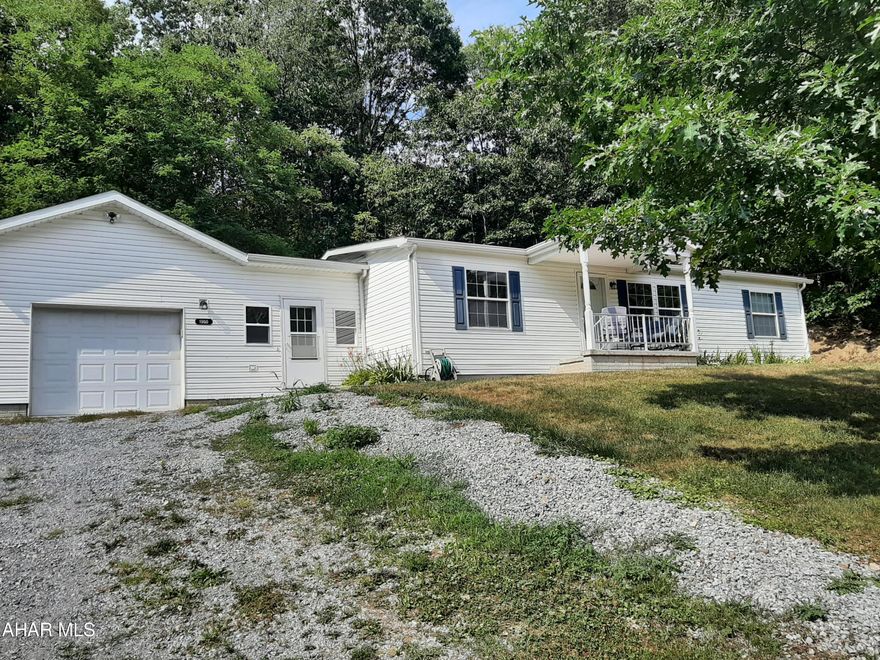 Welcome to this rural location in the Hollidaysburg School District! This well maintained 3-bedroom, 2-bath doublewide is situated on .34 of an acre in a quiet setting. This home also offers a 1 car attached garage with attic storage, breezeway, newer roof, furnace, and central AC. A nice covered front porch to enjoy or entertain on the back deck with dining room access. The spacious open floor plan allows for large gatherings, or just cozy up to the gas fireplace. Call for your tour today!