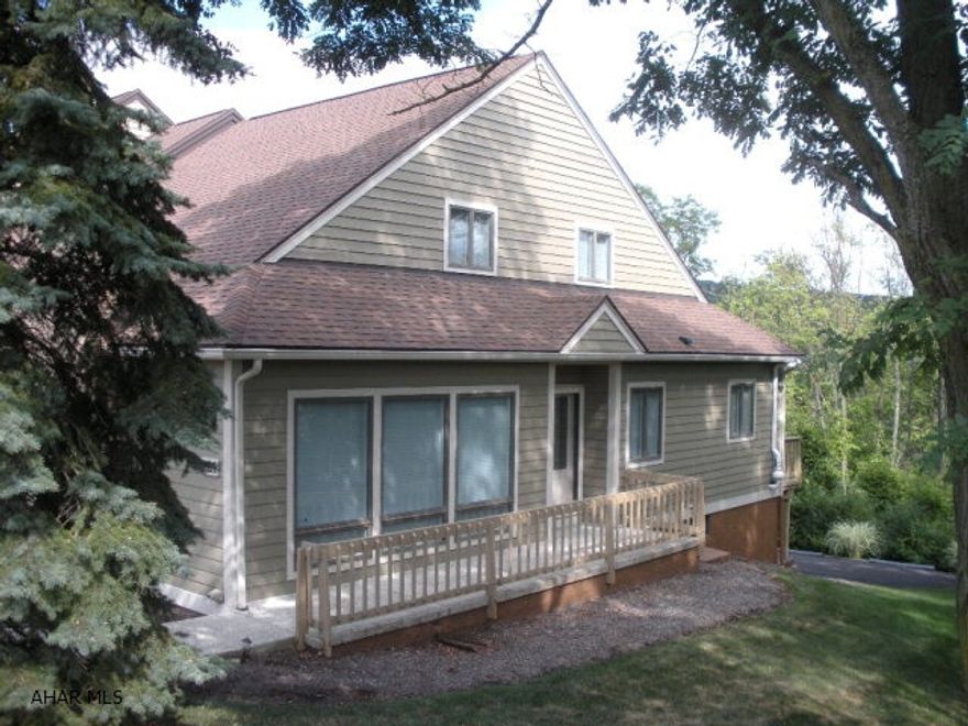 Beautiful end unit town home at Parkridge across from Park Hills Country Club. The property was completely renovated within the last 2 years, the kitchen is all espresso stained maple cabinets with subway tile back splash, brown ice granite countertops and Kitchen Aid stainless appliances. First floor laundry and powder room, master bedroom, master bath with huge walk in ceramic tile shower, walk in closet and private rear deck. There are 2 additional bedrooms and a renovated full bath on the second floor. The living room has a beautiful fireplace and vaulted ceiling. The lighting is Restoration hardware. There is a 2 car garage, new heat pump with central AC plus hot water baseboard heat.