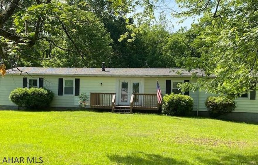 Beautiful ranch home backs up to Dunnings Creek.  Three bedroom, 2 bath home with large living room, and family room.  Updated roof and windows, large detached two car garage, large yard, flat lot.