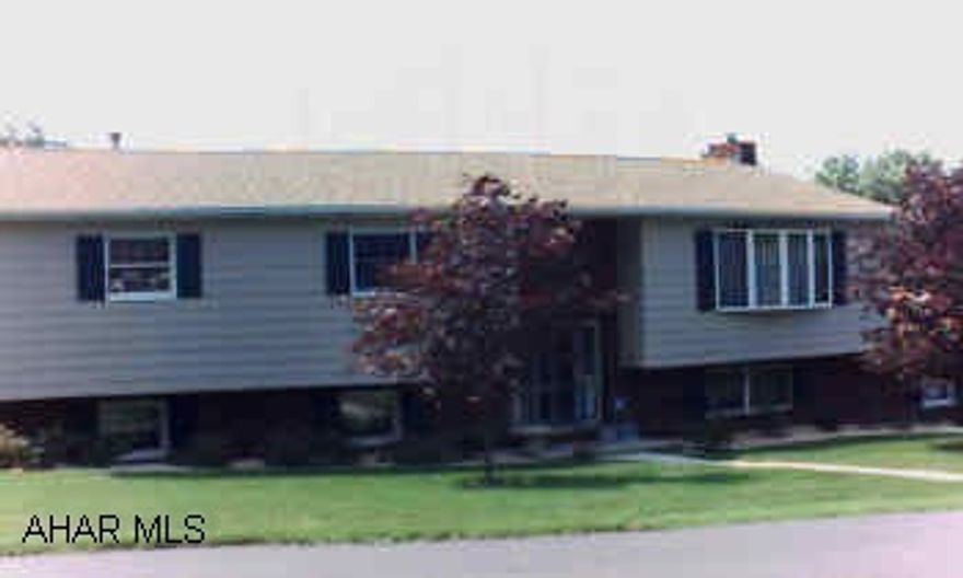 Split entry/attached 2 car garage, swimming pool and hot tub. New roof in 99, new furnace in 98 with 10 yr warranty