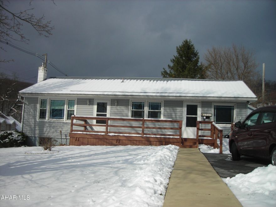 Looking to down size, you just found this cozy 2 Bedroom with 1 Full Bath. Wheelchair accessible, vinyl siding, newer metal roof, 1 car garage all on 4 city lots 100x120. Seller to verify lot size and taxes. Home is handicap accessible.