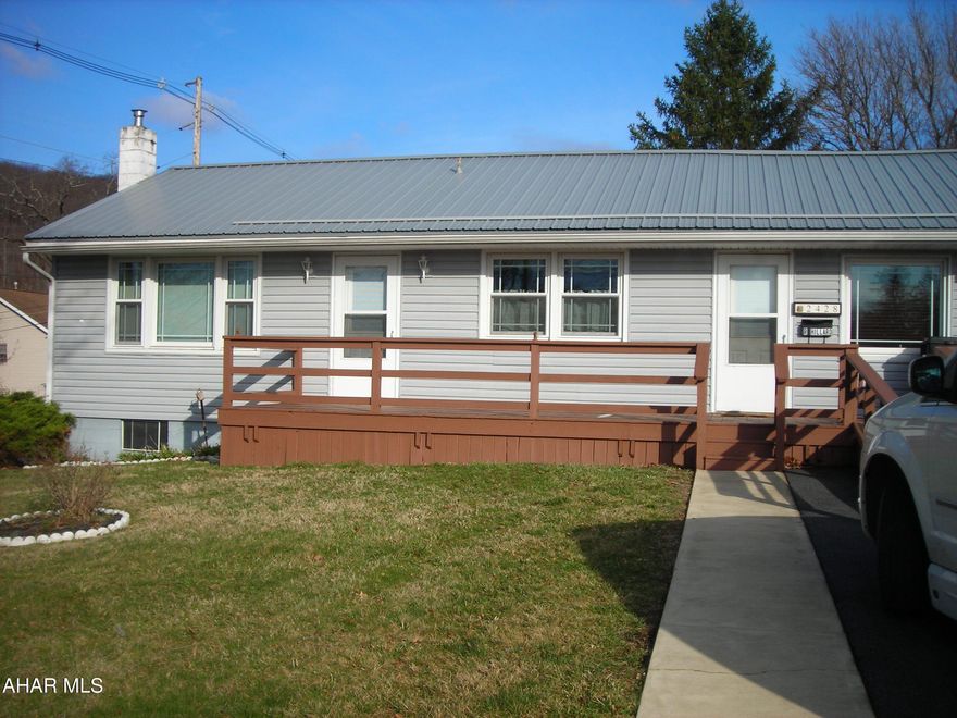 Looking to down size, you just found this cozy 2 Bedroom with 1 Full Bath. Wheelchair accessible, vinyl siding, newer metal roof, 1 car garage all on 4 city lots 100x120. Seller to verify lot size and taxes. Home is handicap accessible.