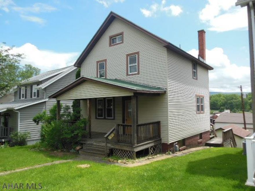 Nice 2 story with new kitchen and bath. Hardwood floors Through most areas, ceramic tile also. New appliances and newer furnace. One car detached garage on 40x120 lot. High basement with walkout to rear. Nice area!