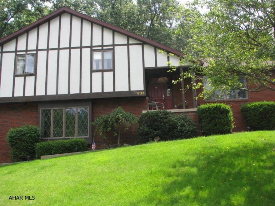 Beautiful four level home in a desirable neighborhood. Kitchen has been updated with cherry cupboards and appliances.All rooms are very large and have lots of windows. Wondering how a four level is laid out? When walking in from the two car attached garage you will find the spacious family room and bathroom.  Take two steps down and there is a laundry and tons of storage.  This area could be finished for whatever you wanted it to be.  A few steps up from the family room you find the main living area.A few steps up from there and you will find the bedrooms and 2 more bathrooms. This home also has a beautiful patio in the back. It is extremely secluded for your privacy. All the grounds have been impeccably manicured with plants that are beautiful yet low maintenance.New garage door openers.