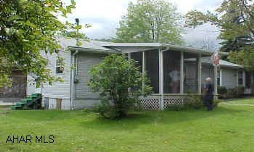 2 BR bungalow, on 125x120 lot, upgraded kitchen, garage door opener-no transmitter, screened in porch and enclosed back porch.  New roof, furnace, 2 outbuildings, laundry in kitchen.  two rooms hardwood floors(LR/front BR).  LR & DR somewhat newer carpet. 2 BR bungalow, on 125x120 lot, upgraded kitchen, garage door opener-no transmitter, screened in porch and enclosed back porch.  New roof, furnace, 2 outbuildings, laundry in kitchen.  Two rooms hardwood floors LR& front BR.  LR & DR somewhat newer carpet. Low taxes