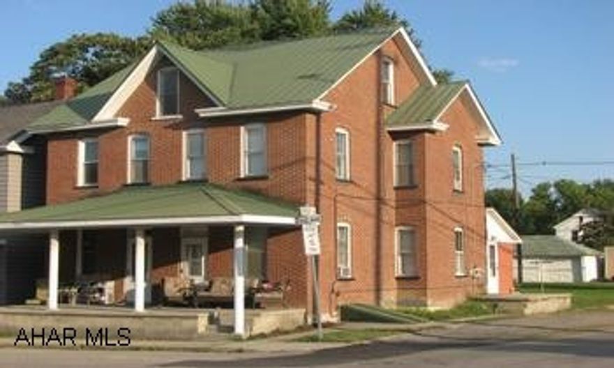 Large brick duplex with good rental income, large yard and nice neighborhood. Large brick duplex in Hollidaysburg schools, separate utilities, $1125. month rental income. Won't last long.