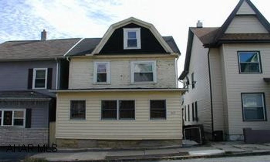 2 1/2 Story with detached garage.  Above average condition with modern kitchen - new carpeting.  Low taxes. 14 X 23 garage.  Attic is finished & heated. 2 1/2 story with detached garage.  Above average condition with modern kitchen - new carpeting.  Low taxes. 14 X 23 detached garage.  Attic is finished and heated.