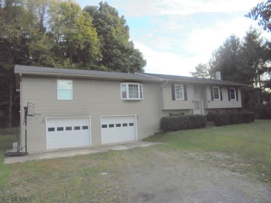 Ebensburg- 4 BR, 3 1/2 bath vinyl sided bi-level on approx 1 ac. Oil HW BB heat & 2 car integral garage.