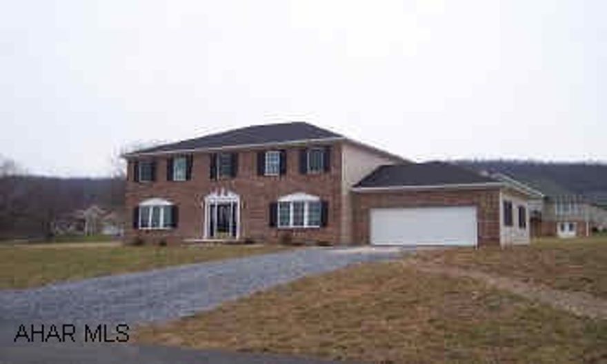 2 story brick and vinyl New constructed elegent brick and vinyl 2 story home in a much desired developement.. Custom Kitchen with granite countertops, living room with fireplace and ceramic tile open foyer, private mastersuite and upstairs laundry. two car garage