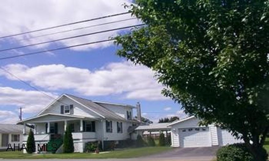 Cozy Cape Cod on large level lot, new oak kitchen, pergo floors, freshly painted interior, 2 garages, nice patio, all appliances. Just move in!