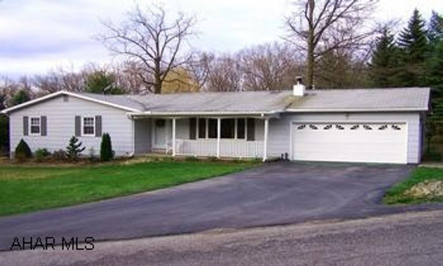 PICTURE PERFECT RANCH HOME on private, secluded setting.  Beautiful newer kitchen, newer thermo windows and doors, finished basement with family room and 2 additional bedrooms, 2 car attached garage, central air, storage shed and updated mechanics. All on over 1/2 acre!  Sewer is holding tank at $35 per month.