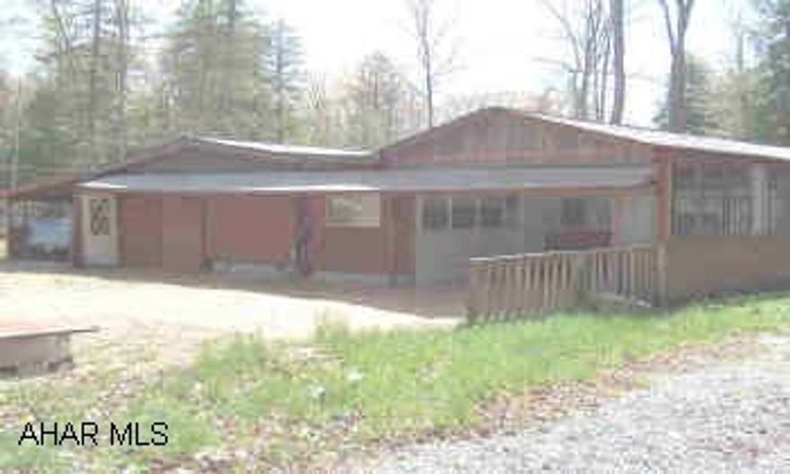 camper with room built around- carport, large patio