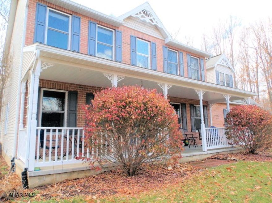 Very private setting complete with wildlife for this large two story home in the Bellwood School District.  Spacious ceramic tile entry with formal dining room on right, formal living room on left.  Kitchen opens to first floor family room.  All newer floor coverings.  Large bonus room above garage could be 5th bedroom or hobby room.  So much space inside and out!  Very rare to find this kind of seclusion and a 1.7 acre lot in a residential development.  Beautiful views from front porch.