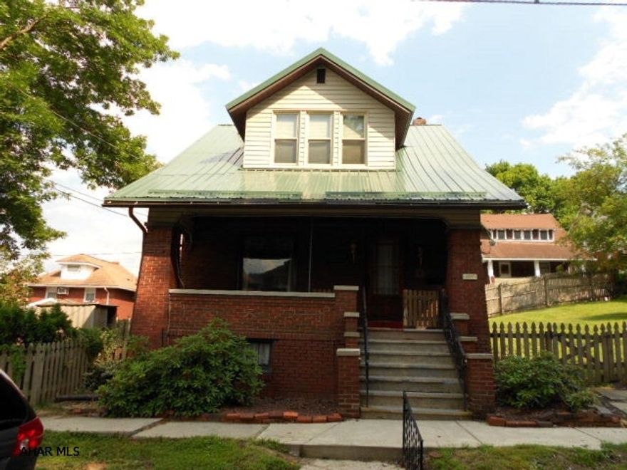 2 story home on a double lot!!! 2nd floor has been updated with hardwood, new bath room, new windows. Bedrooms offer deep closets and ceiling fans. Property has a new metal roof. 1st floor has hardwood floors in living room and dining room. Large kitchen and a closed in back porch that can be used as a pantry that goes out to the covered deck. Hot water heat including the basement.MOTIVATED SELLER, MAKE YOUR BEST OFFER!!!!!!!!