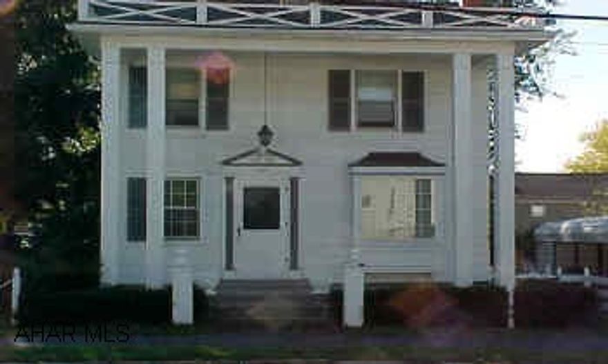 cute corner lot, ceramic tile in kitchen, summer porch on second floor, pretty landsscaping