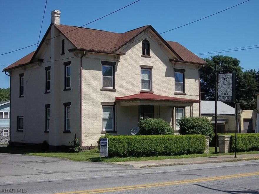 Former Chiropractic Health Office that could be used for a variety of professional services. Has 2 exam rooms, office and a waiting room on main level. Also has a 1 BR apartment on 2nd level for extra income or to live in. Call today to make an appointment to see this great property.
