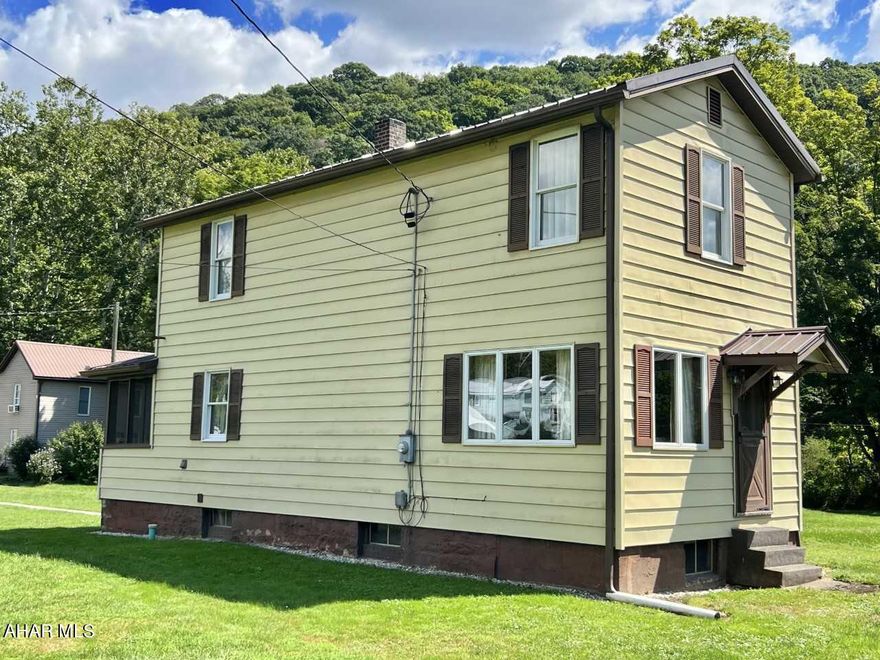 You can quicky move into this fully furnished home in the borough of Ursina.  Flat double lot with a detached 2 car garage with connecting sidewalk.  Screen porch, new metal roof, new water conditioner to name a few of the amenities.   Very close Laurel Hill Creek which is a coveted fishing spot.  Not far from Ohiopyle, Yough Dam, Rails To Trails biking/hiking trails.  Just a few miles from various golf courses and resorts.  Much of the furniture conveys with the sale. This one will move fast.  Call today for your showing!