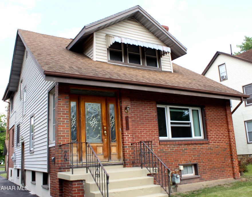 This multi unit is 1st and 2nd floor.  Hardwood floors...new appliances.  Separate entrances...2nd floor has tenant. Basement has washer/dryer available.  Driveway is from Logan Blvd. to alley behind garage.  Off street parking.

Owner pays gas..25-100/month...and water/sewer..100/month..flood insurance is through FEMA..buyer to research their cost for flood insurance.