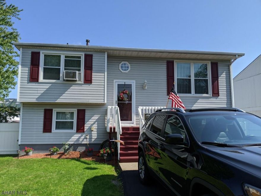 Meticulously maintained 2 bedroom home. Newer carpet, updated full bath. Master bedroom with walk-in closet. Finished lower level with newer carpet, recessed lights, and a walk out to the rear patio and fenced yard with above ground pool and 2 sheds. Paved off-street parking.