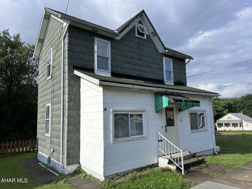 Nanty Glo - 2 story three bedroom, 1 bath home on level lot. Large spacious kitchen, formal dining room, & LR on the first floor. Enclosed front porch. Oil, forced air heat. Priced to sell.