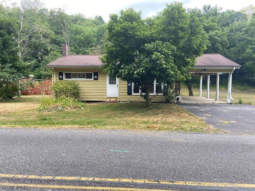 3 bedroom, 1 bath house with a large yard and above ground pool.