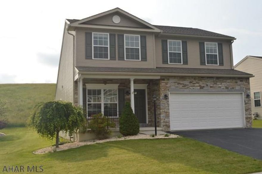 In one of the newest developments in Duncansville this home is beautiful inside and out!  Move-in ready and lots of opportunity to make this house your own with a large open floor plan, convenient first floor master suite and phenomenal 9 ft ceilings. The 2nd floor has two large bedrooms each with walk-in closets. The basement is huge and ready to be finished. Beautiful deck and breathtaking views of this friendly neighborhood within Harvest Glen.