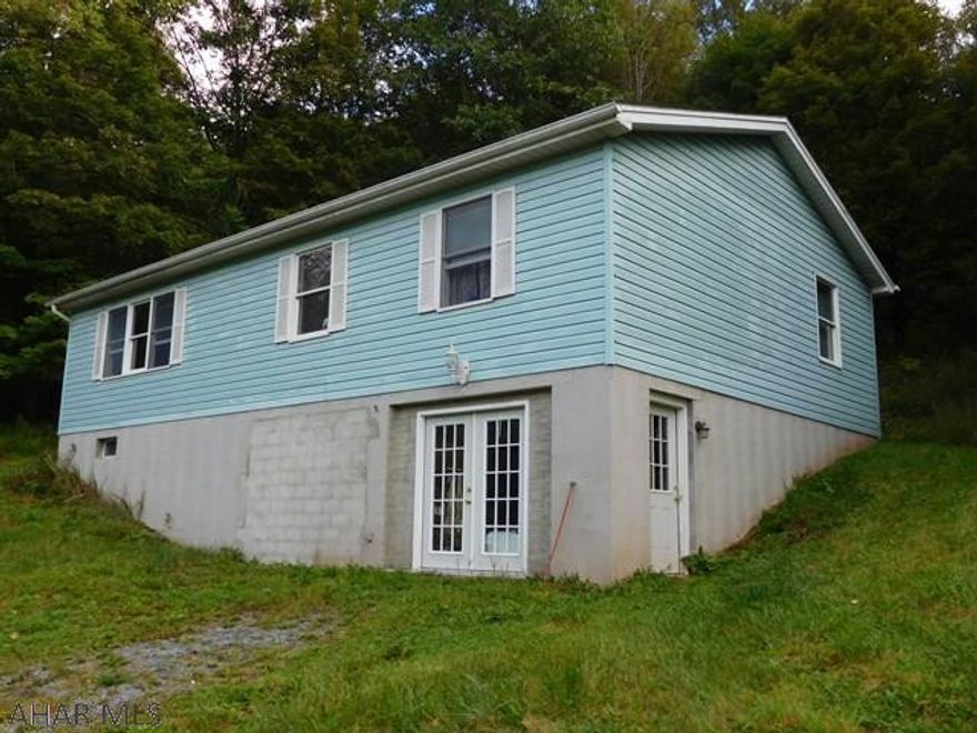 This ranch home has 3-bedrooms, 2-baths, set on 2.0 mostly wooded acres with a private well and septic.  Recently updated main bath with ceramic tile waincot and flooring, newer carpet in the living room and hall, oak kitchen cabinets and much more.