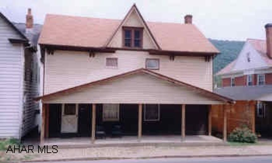 TWO STORY WITH REMODELING ALREADY STARTED.  5 TO 6 BEDROOMS.  NEW LAUNDRY 1ST FLOOR.  BEAUTIFUL LARGE OAK BATHROOM AND MORE.  OFF STREET  PARKING!!