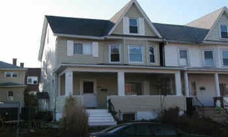 2 1/2 story vinyl - 4 bedrooms, 1 bath. Original oak molding, pocket doors, new oak kitchen, brand new roof. - Must See!! Agent Owned!