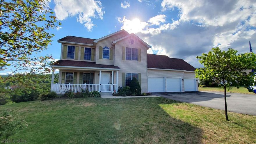 Splendid Elkview Development opportunity!  This 2 story beautifully maintained & updated home features an over-sized 3 car, heated garage & huge fenced yard. Sensational views can be enjoyed from the back deck. The house offers a family room with a gas fp & huge windows for an abundance of natural light.  The open concept KT is only separated from the family space by a bar perfect for entertaining. The kitchen offers an abundance of cabinet space along w/ a huge pantry, double ovens, a wine refrigerator & breakfast nook all trimmed in beautiful hardwood flooring.  The second floor has 4 bedrooms, one of which w/ its huge 402sq.ft. could offer many usage possibilities! The master bedroom is very spacious and offers a marvelous master bath with step in shower, jet tub, water closet and WIC.