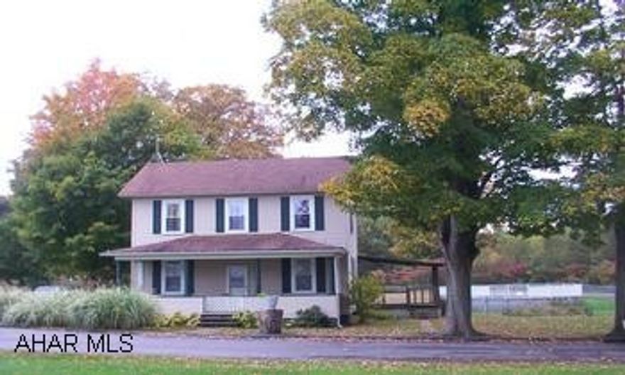 Lovely spacious home on giant level lot on dead end street next to the park. Two story 2 car garage with heated finished second floor, newer roof, siding, and windows, pellet stove, heated above ground pool, priced for quick sale. Directions - turn off Main street at painter sign to Laurel street.