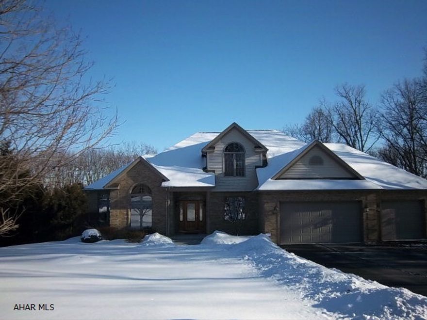 Beautifully maintained 5 bedroom home with very private setting for entertaining. Deck wraps around the entire back of the home and over looks the pool & spa. Features a first floor master, two furnaces and air conditioners and three zones of climate control. New granite counters, stainless double bowl sink in kitchen and new appliances. Agent owned.