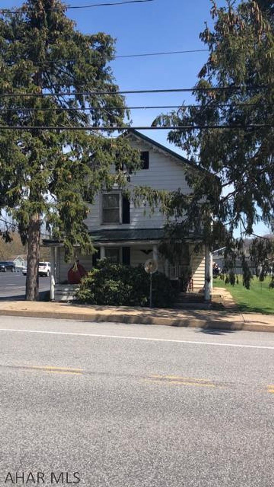 Calling all investors!  Whether you are looking for a fixer upper residence, income opportunity as a rental, or business/professional building, check this property out.  Currently 2- 2 bedroom unit apartments currently rented with month to month leases.  Units have their own laundry facility and separate utilities; water/sewer, electric, and heat.  Property is zoned R-4 = residential business/professional district of Bedford Borough.  Off street parking is available.  Great location right off of I99 Bedford Exit.  Close to Rt 30 and Bedford Turnpike.  Walking distance to downtown Bedford.  Property is being sold As-Is.