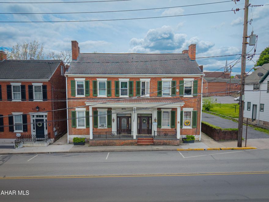 UNLIMITED POTENTIAL !!!  Are you looking to invest in an established business?  Located in quaint, Historical Bedford - this restaurant and tavern with full liquor license is worth a look.
The impressive 1860 brick building has an established restaurant on the first floor, with seating for 95+.  Matching mahogany entrance doors welcome diners into the restaurant's 2 dining rooms, which are handicap accessible.  Custom oak woodwork, including window framing, fireplaces, door vestibules - even custom paneled walls.  Take a moment to look at the Before & After photos book of the renovation. Possible first floor retail space with some reconfiguration.
The Tavern is located in the lower level, with a full service, 25 seat bar, table seating for 70 and separate game room with pool table.
Wiring and plumbing have been updated, added insulation, and external ganged electrical panels installed.
A new kitchen was added, five times the size of the original.  All equipment, furnishings, and inventory for both the restaurant and the bar convey with the property.
The second and third floor apartments provide extra income with one large apartment that could be owners quarters. Property also includes 25 off street parking spaces.
 Bedford's rich history, original architecture, State parks, hiking trails, fishing, Omni Bedford Springs Resort and the Fall Foliage Festival provides lots of things to see and do. Being 2.5 hours in any direction from 3+ major cities make Bedford the perfect destination for day trips, weekends and getaways - providing new and repeat customer flow. All of which makes this property a great opportunity for the savvy investor.