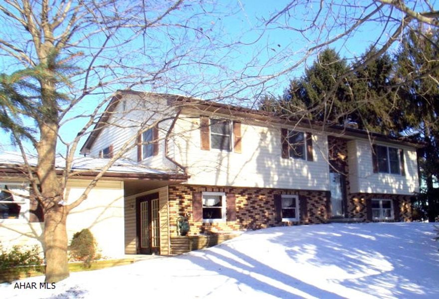 Large family home on level lot. Bellwood Schools. 2 large familyrooms. Hot water heat with three zones, central air, 2 car garage with heated insulated workshop