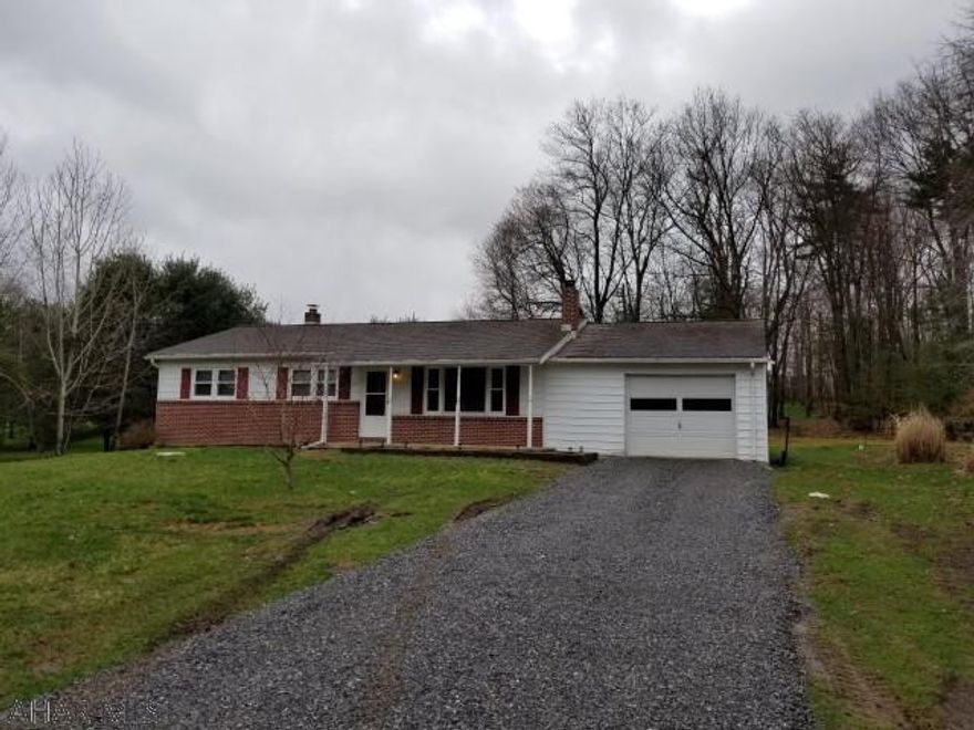 3 bedroom rancher on .39 acre near Warriors Mark. 1 car attached garage. Sun porch.