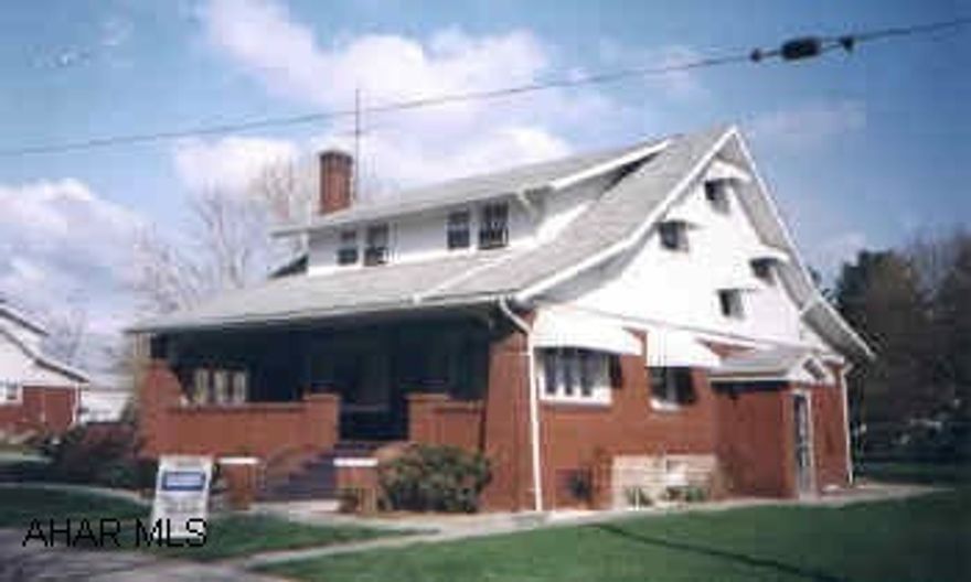 GREAT PROPERTY. WELL MAINTAINED 2 STORY HOUSE PLUS 9 GARAGES & 2.04 ACRES. BEAUTIFUL SETTING. NEVER USED FURNACE.