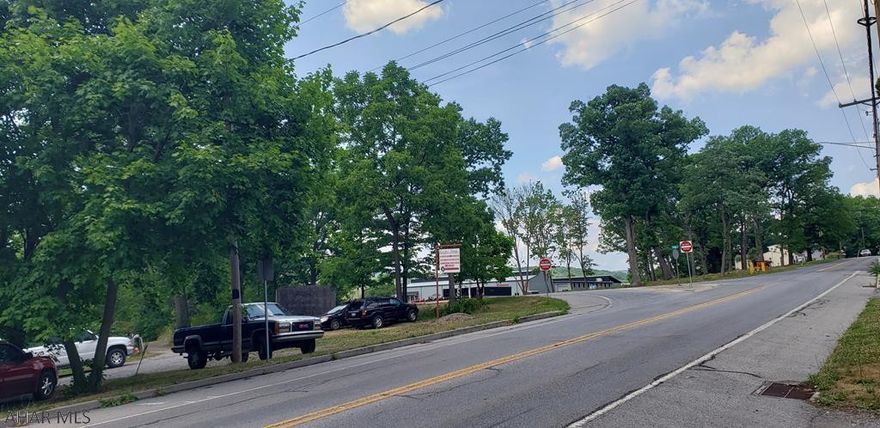 REDUCED PRICE! COME TAKE A LOOK. Great commerical opportunity in HIGH traffic area. For sale are 2 single family homes, one currently rented, commercial garage, and a large corner lot with road access off Carson Valley Road and Colonial Drive. The back portion is level with endless possibilities. Homes are currently on public water and sewer. Call listing agent for more information.